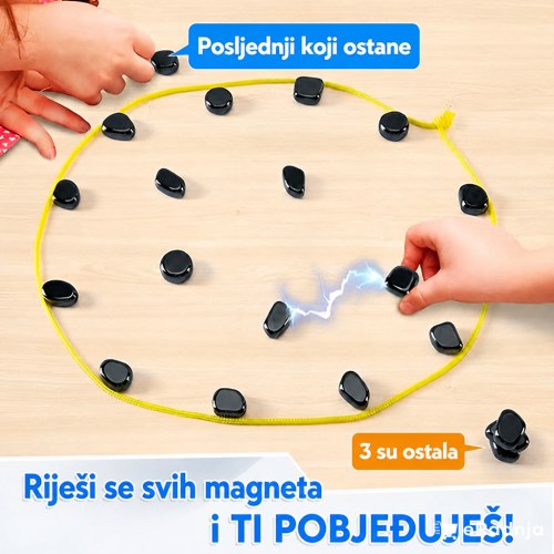 Napeta magnetna igra sa kamenčićima na stolu